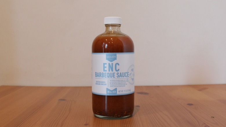 Lillie Q's ENC Barbecue Sauce on a wooden table