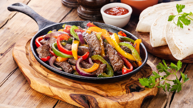 beef fajitas served on a skillet