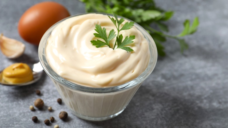 A glass bowl of mayonnaise