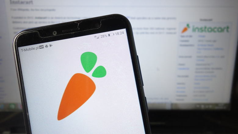Instacart app open on a phone as well as desktop computer