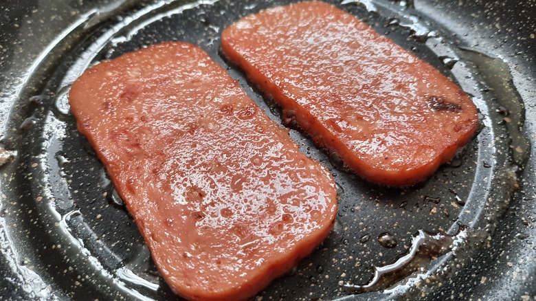 two slices of frying spam