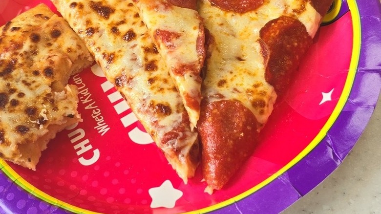 pizza slices on paper plate