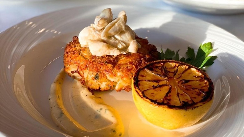 The Palm's crab cake with grilled lemon