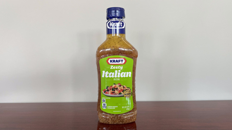 A bottle of Kraft brand Zesty Italian dressing