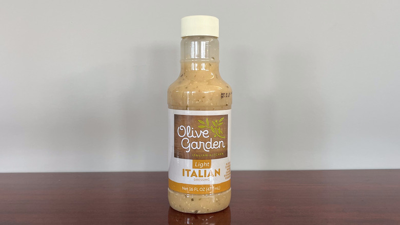 A bottle of Olive Garden light salad dressing