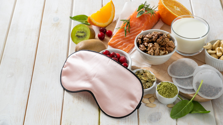 Sleep mask next to foods containing tryptophan