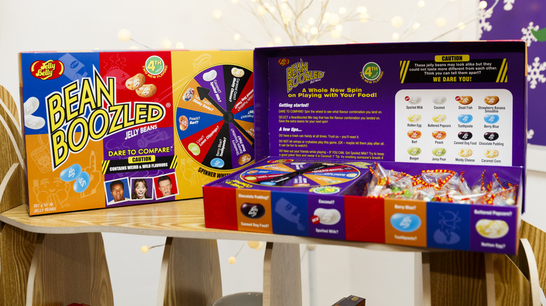 Jelly Belly Bean Boozled game, open to show spinner, candy, and rules inside