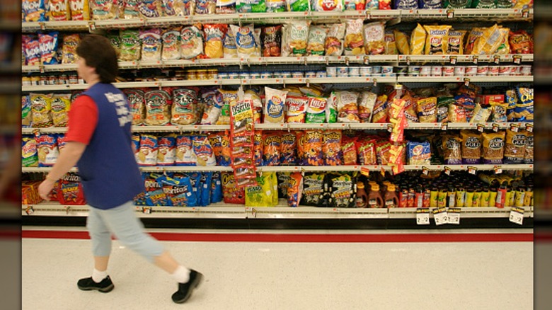 employee walking down aisle