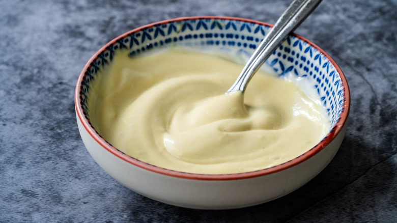 bowl of mayo with spoon