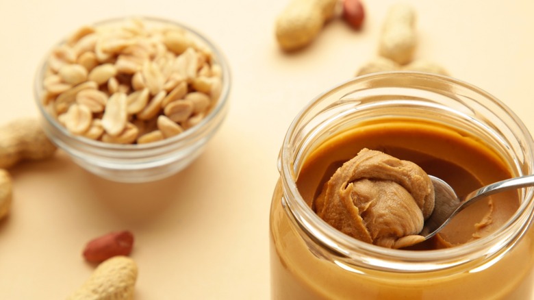 peanut butter jar with peanuts