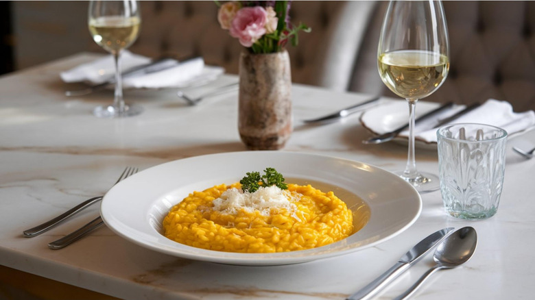 A plate full of risotto alla Milanese.