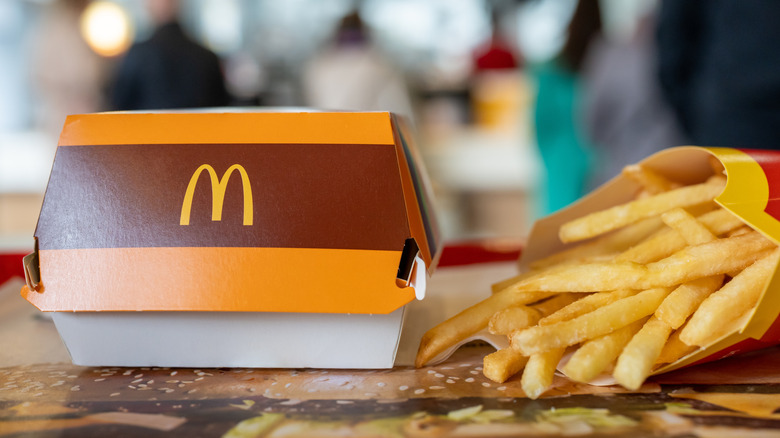 McDonald's burger box next to fries