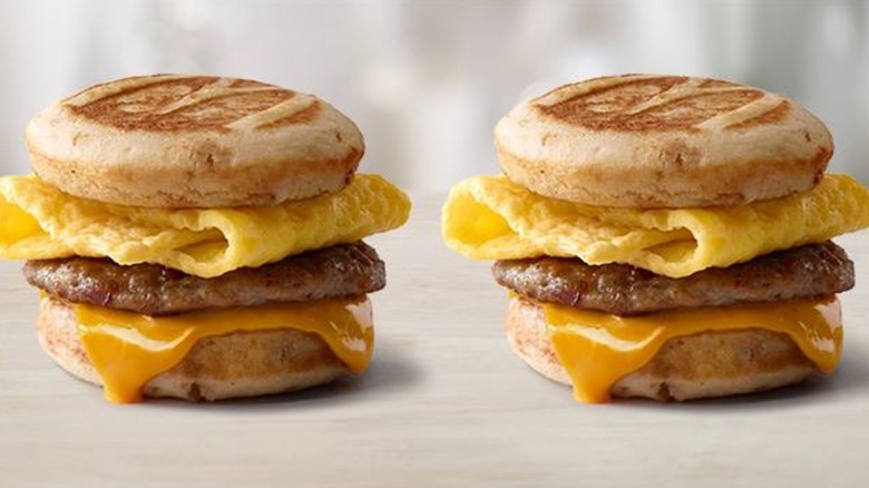 Two identical McGriddles with egg, sausage, and cheese