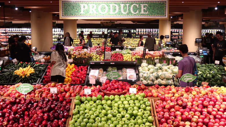 A produce aisle with fruits and vegetables