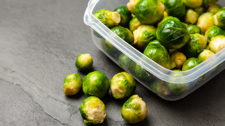 Brussels sprouts in a plastic food container