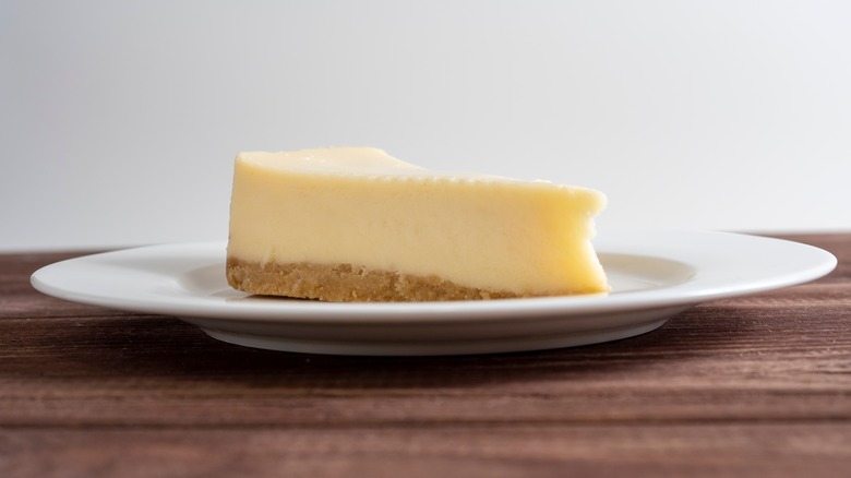 A slice of cheesecake on a plate