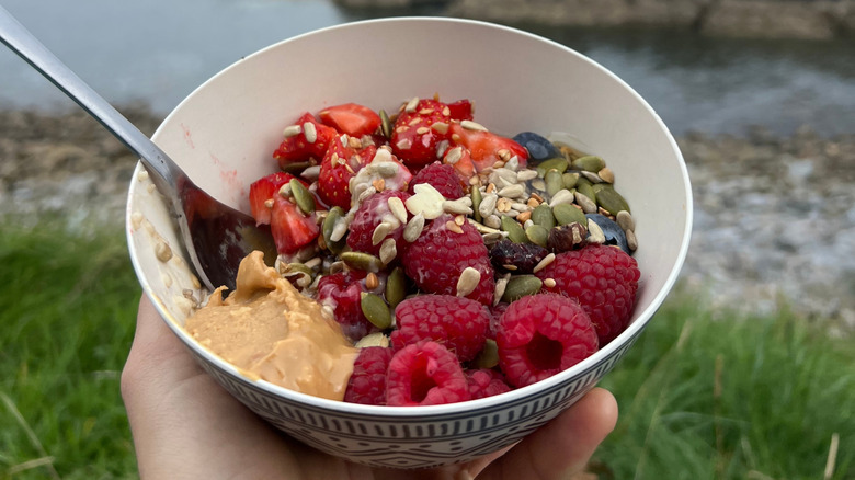 Oatmeal with seeds, butter, and fruit