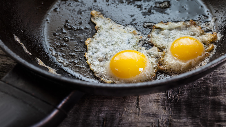 Burnt eggs in a skillet