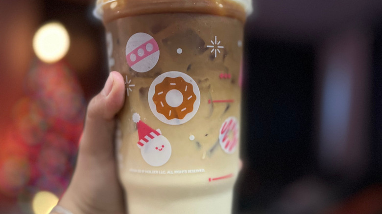 Stock photo of a Dunkin' Caramel Iced Macchiato.