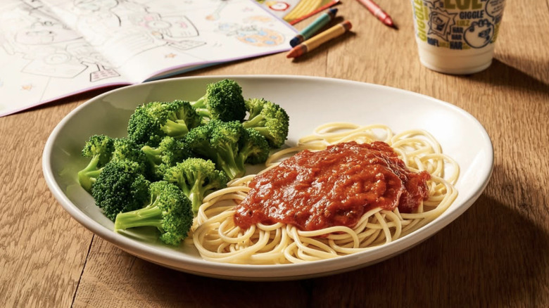 Olive Garden kid's meal with spaghetti and broccoli on plate