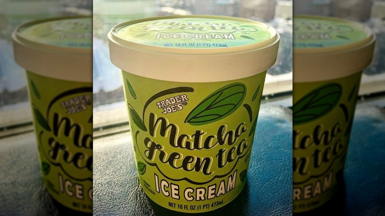 Tub of Matcha Green Tea Ice Cream in front of window