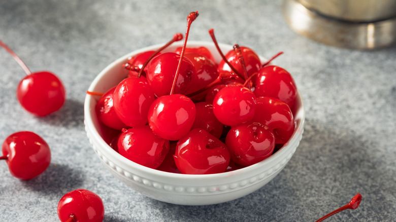 White bowl of maraschino cherries