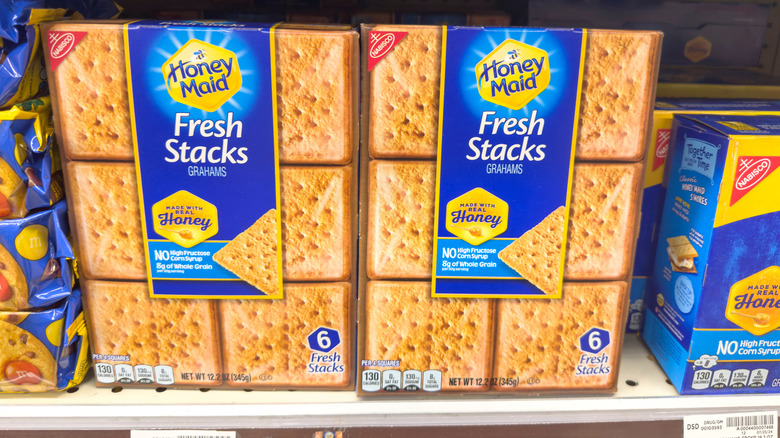 Boxes of graham crackers in a grocery store next to each other