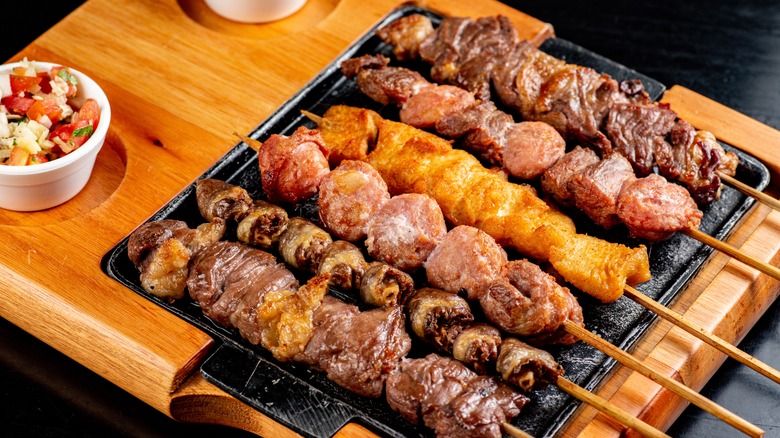 mixed kebabs on wooden skewers