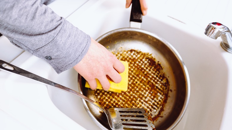 cleaning burnt pan