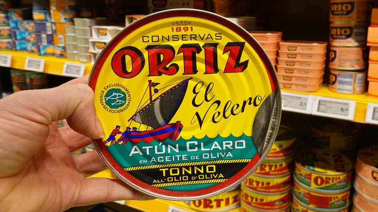 Hand holding Ortiz tuna