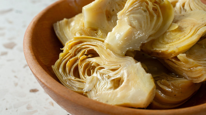 Marinated artichoke hearts in a bowl