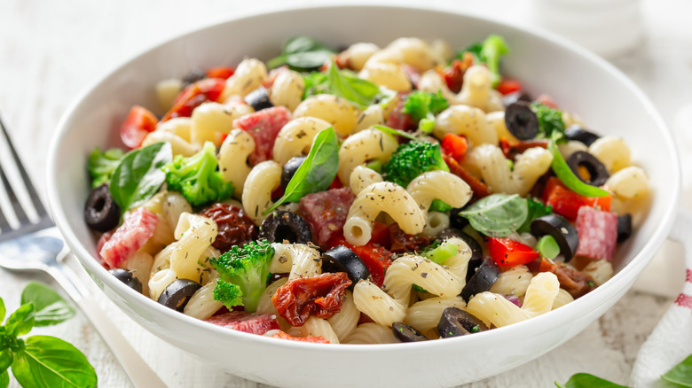 Pasta salad in a white bowl