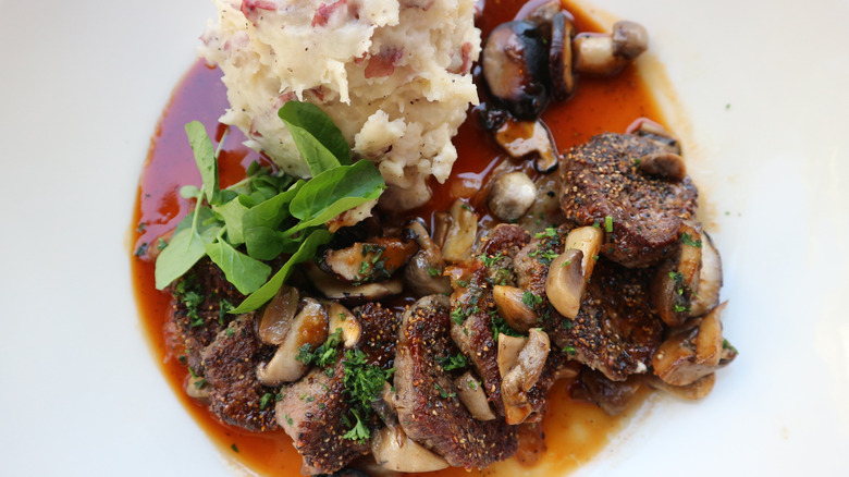 Steak Diane and mashed potatoes from the Cheesecake Factory