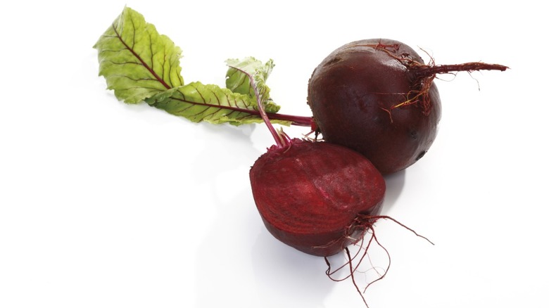 A beetroot that's been sliced in half.