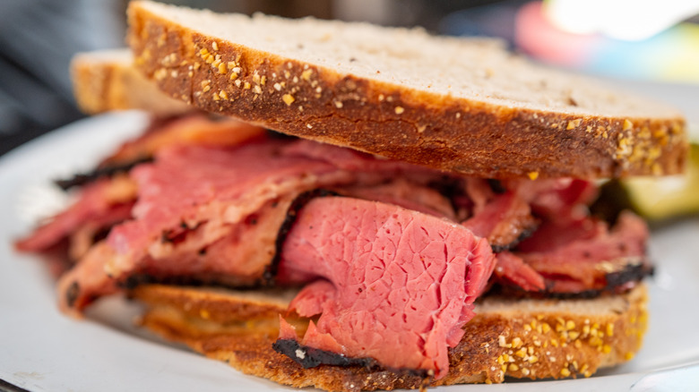 close up of a pastrami sandwich