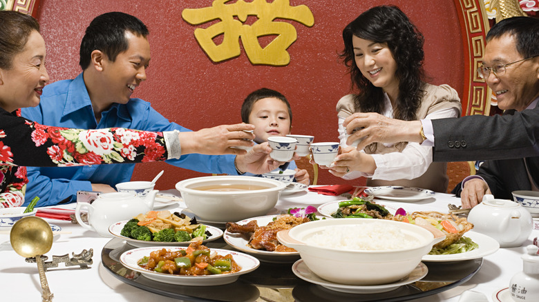 A family sharing a meal at a Chinese restaurant