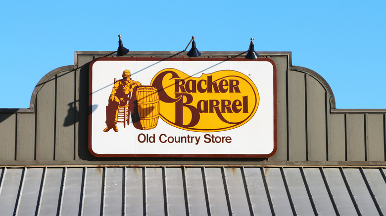 Cracker Barrel sign on the roof of its store.