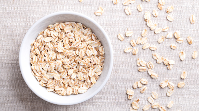 raw oatmeal in a white bowl