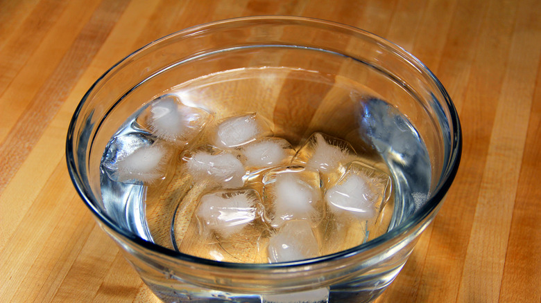 Ice in a bowl of water