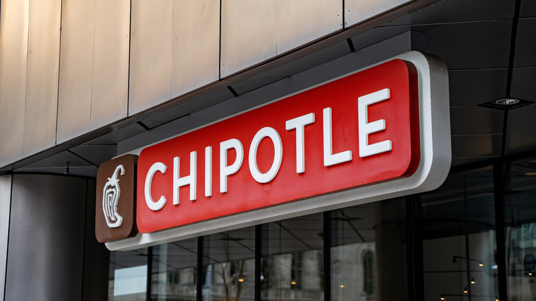 A Chipotle sign outside a restaurant