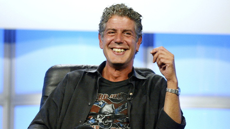 Anthony Bourdain smiling to audience