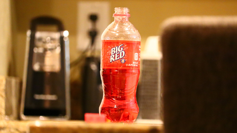 Open bottle of Big Red on a countertop