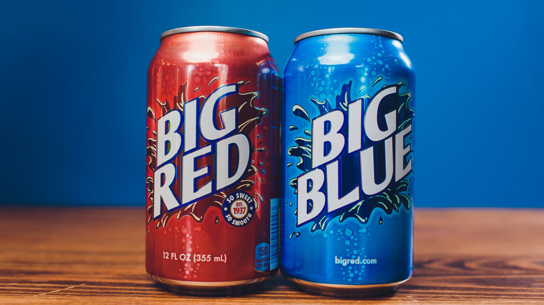 Cans of Big Red and Big Blue soda