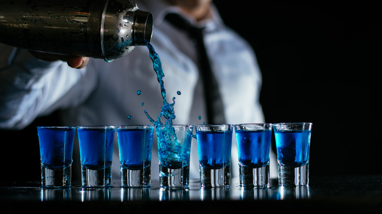 bartender pouring shots