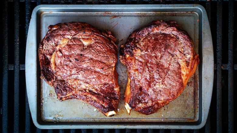 bone-in ribeyes resting