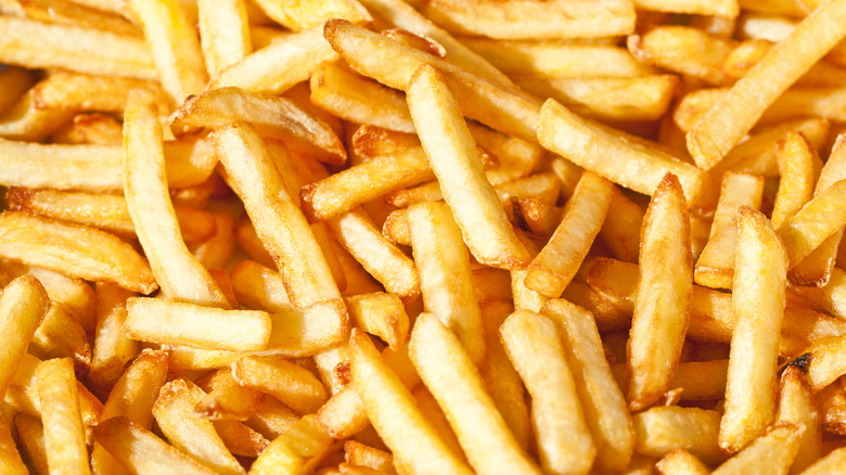 Close up of a group of French fries