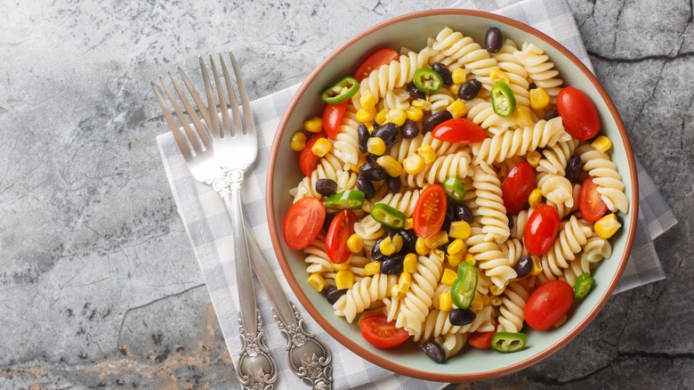 pasta with cherry tomatoes in a bowl