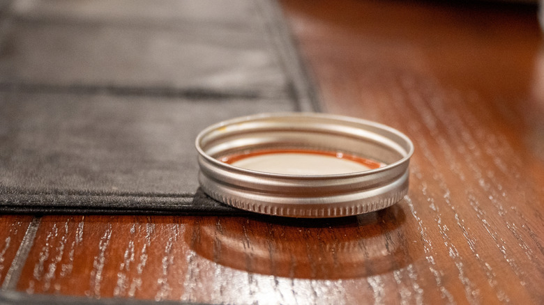 Mason jar lid on table