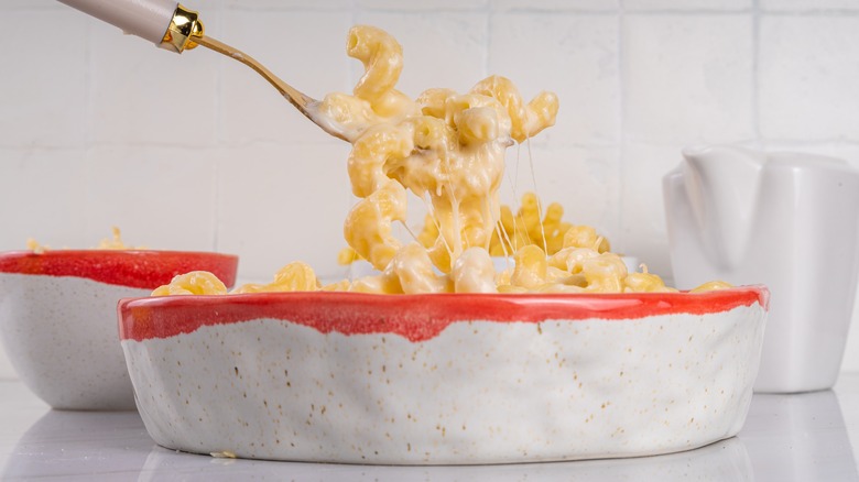 grated cheese on wood board