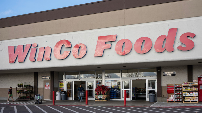 The exterior of a WinCo Foods location during store hours.